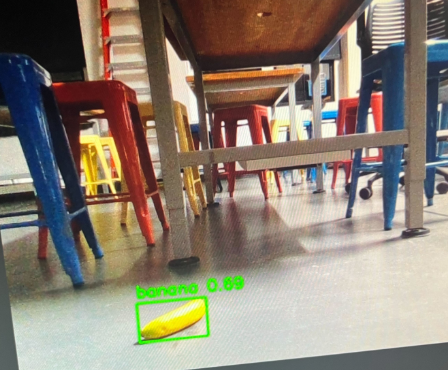 YOLOv11 detecting a banana with bounding box